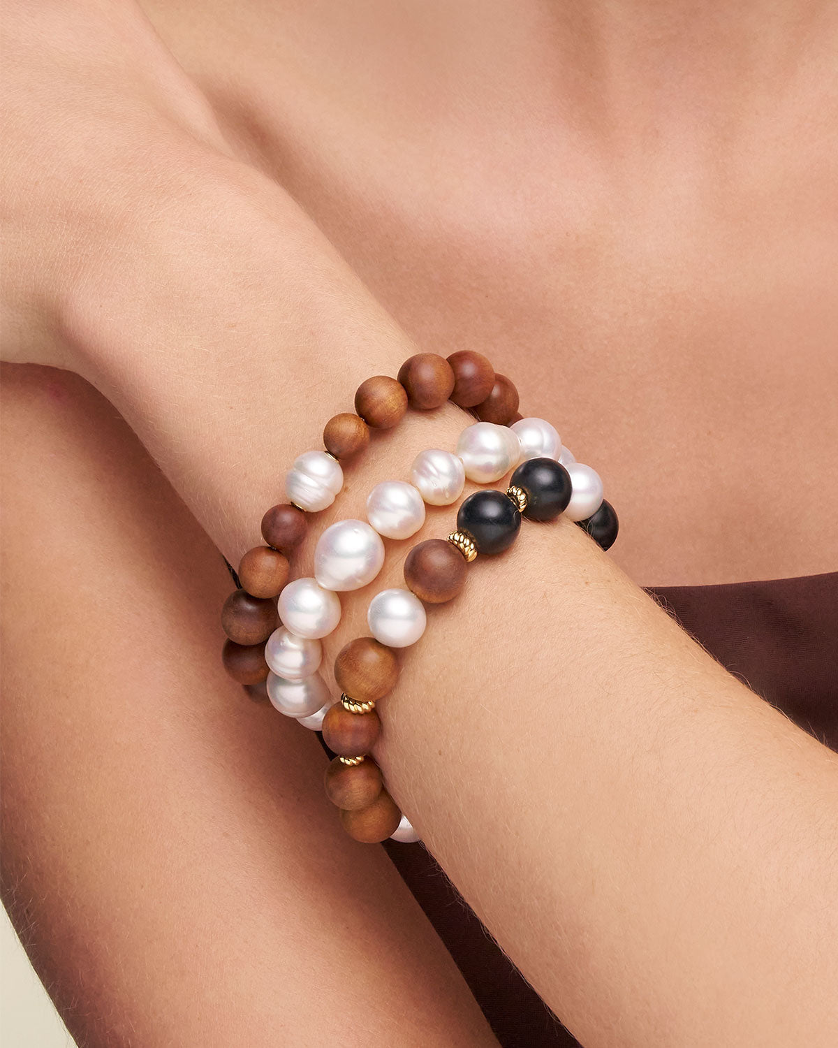 Kimberley Golden Dusk Pearl Bracelet On Body CSRB31DMX Kimberley Dusk Single Pearl Bracelet CSRB23SPC11 Delfini Pearl Bracelet SBDELF002