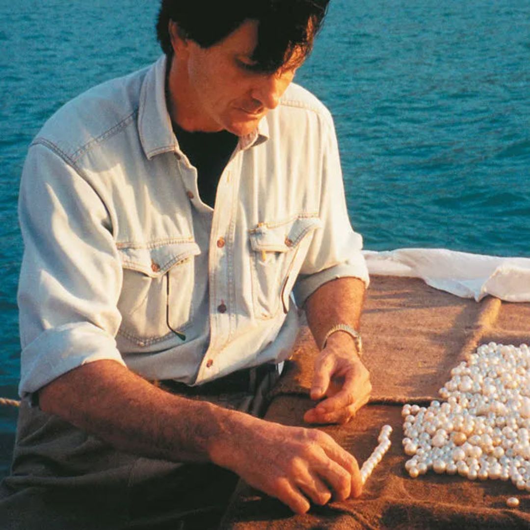 Nicholas Paspaley AC sorting and grading the annual pearl harvest