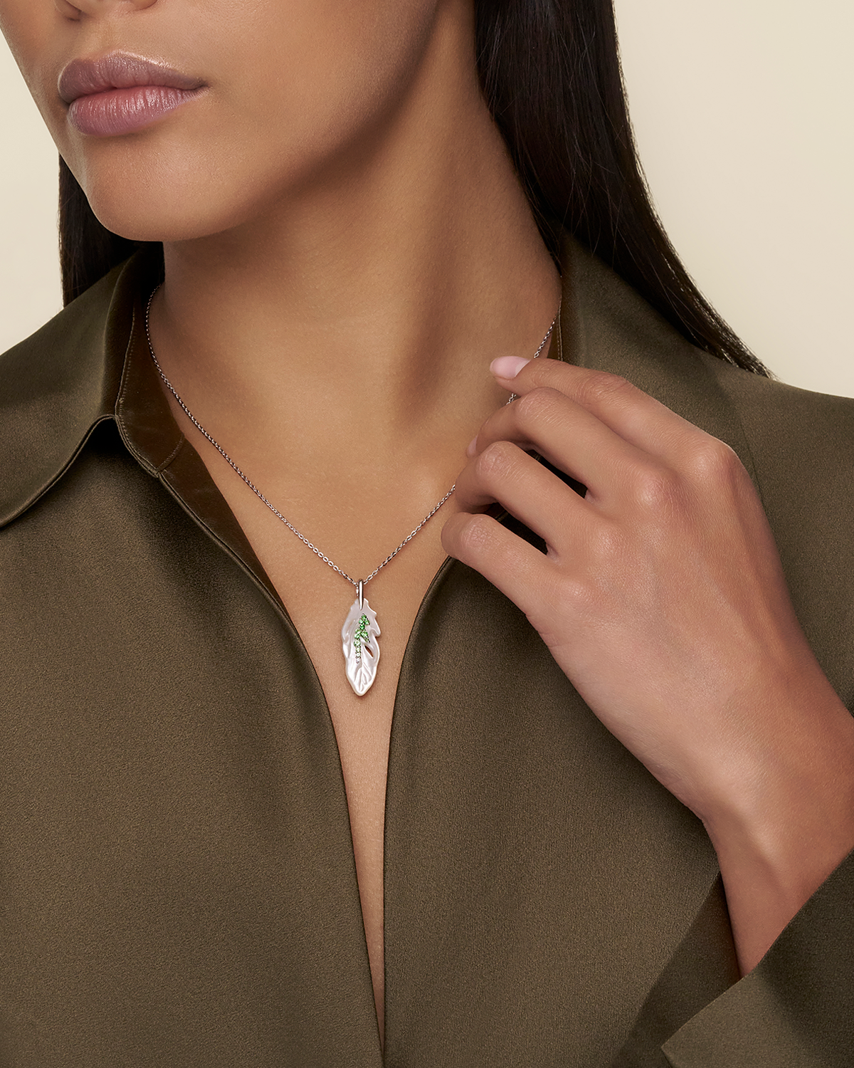 Single Feather Necklace Mother of Pearl Tsavorites and white gold on body de22p02w