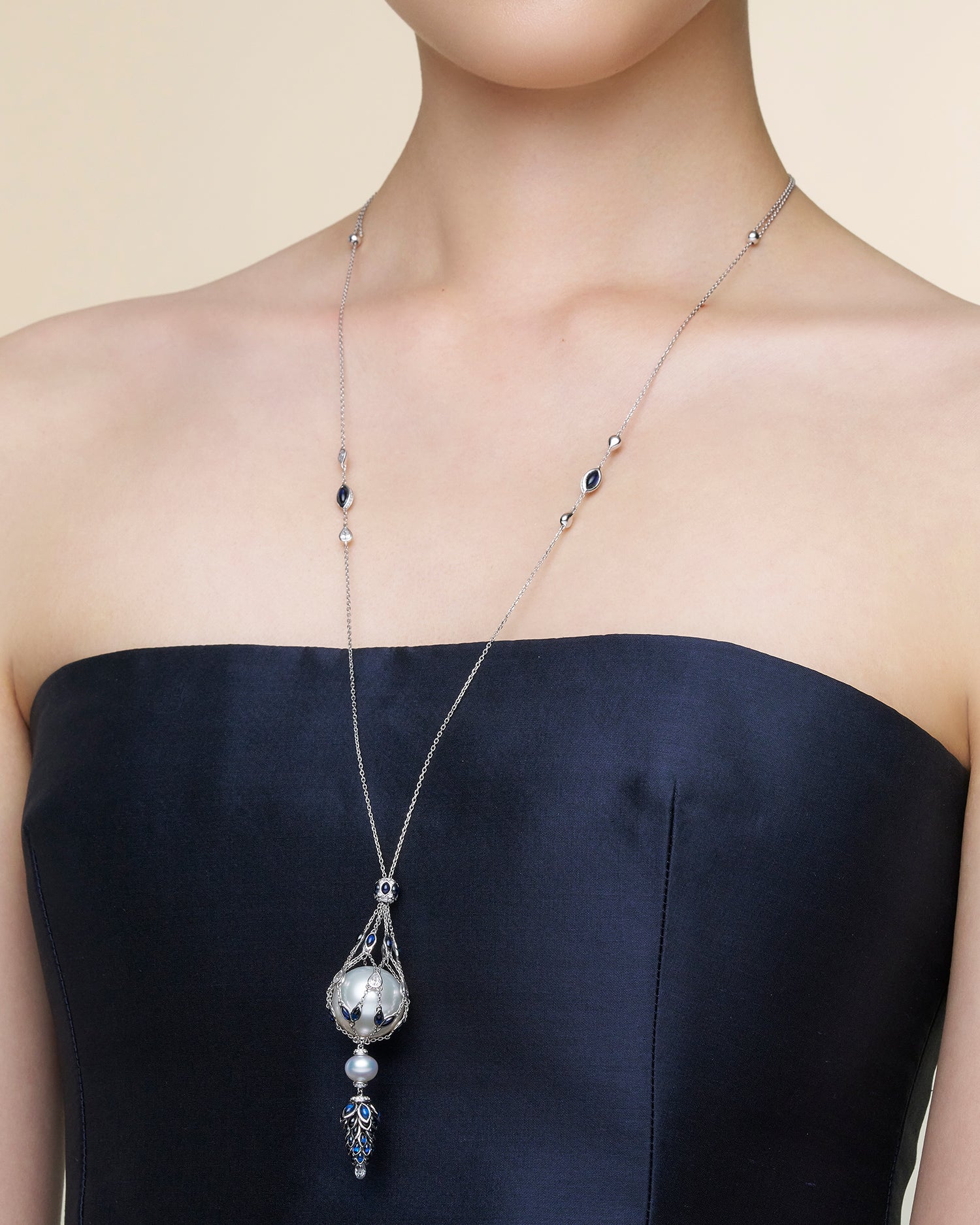 Blue Sapphire Hero Lavalier Pearl Necklace | 17mm Round Pearl, Blue Sapphires, and White Gold