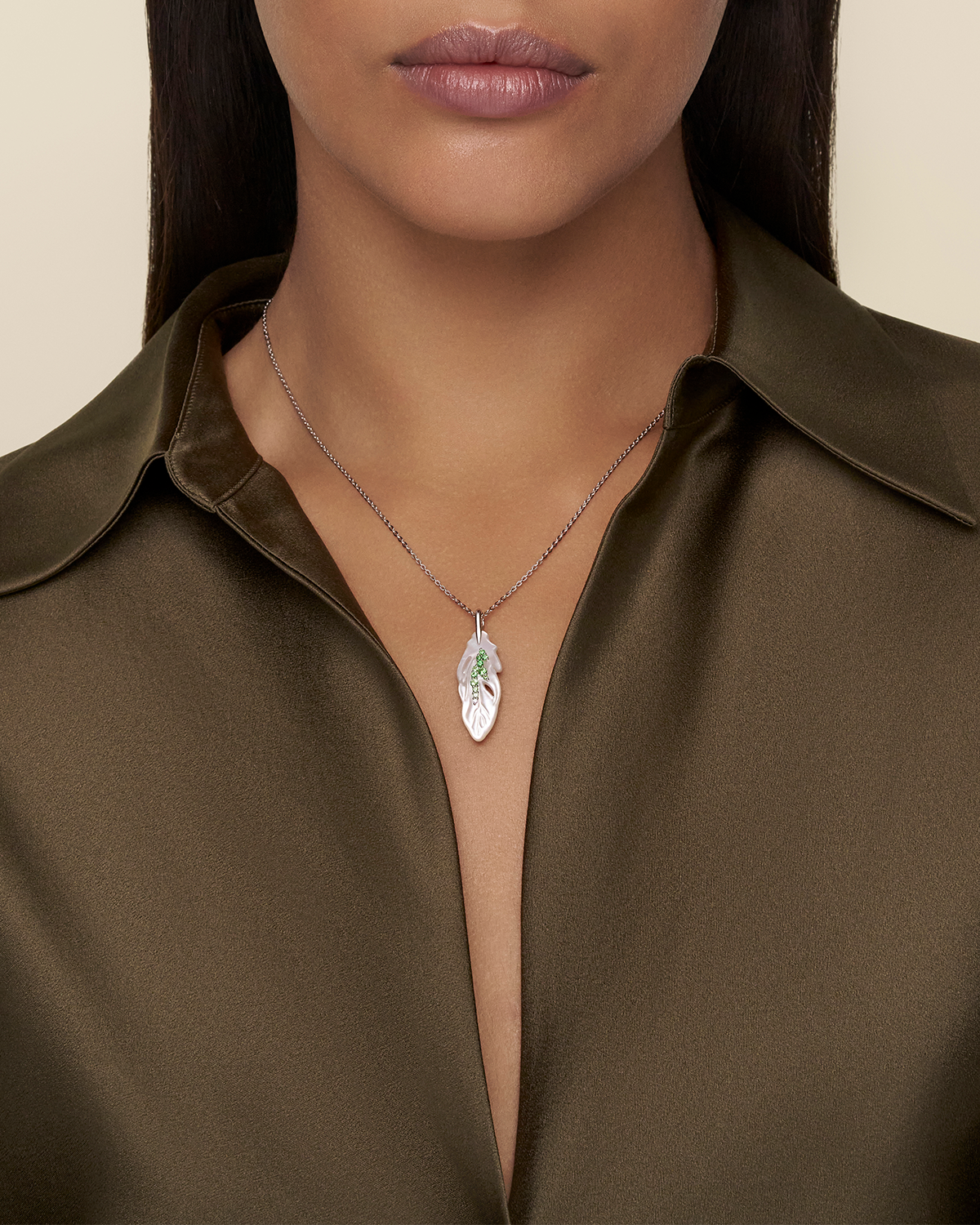 Single Feather Necklace Mother of Pearl Tsavorites and white gold on body de22p02w