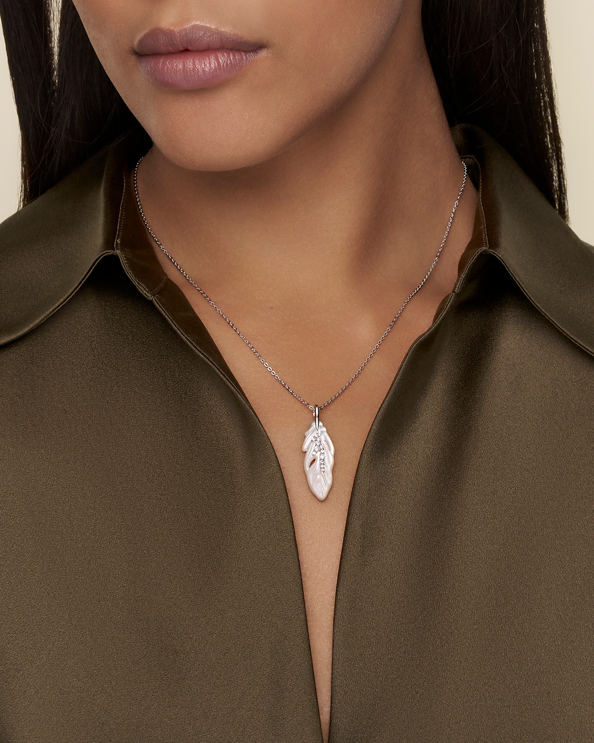 Single Feather Necklace Mother of Pearl Tsavorites and white gold on body de22p02w