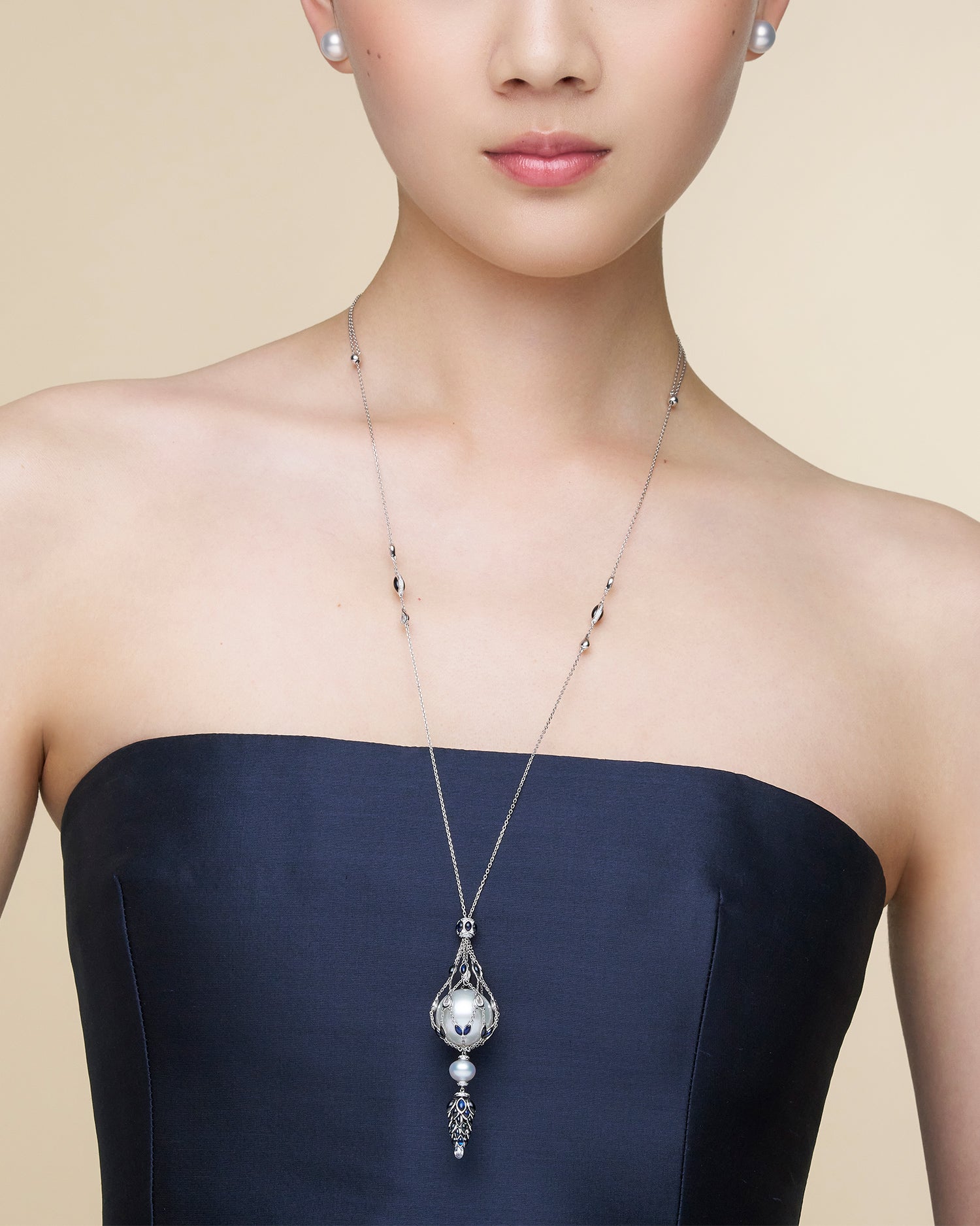Blue Sapphire Hero Lavalier Pearl Necklace | 17mm Round Pearl, Blue Sapphires, and White Gold