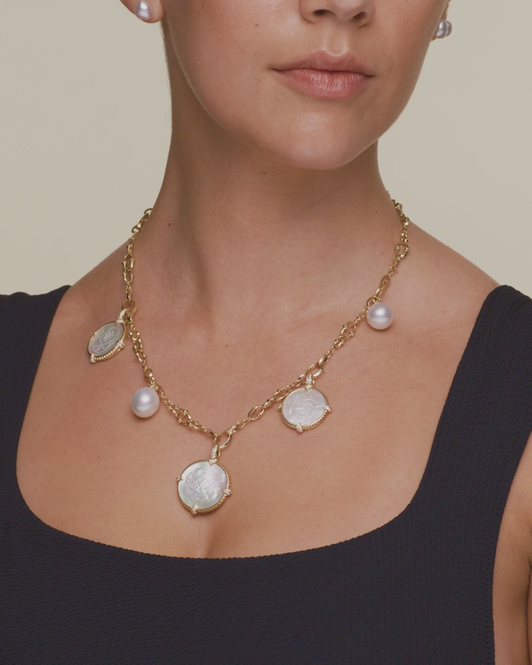 Paspaley Dive Chain Necklace On Body D21N01Y Petite Mermaid Coin Charm On Body D21A01Y Seascape Coin Charm On Body D21A04Y Petite Guided by Stars Coin D21A02Y