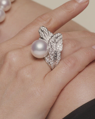 Night bird feather pearl ring with 15mm round pearl, diamonds and white gold
