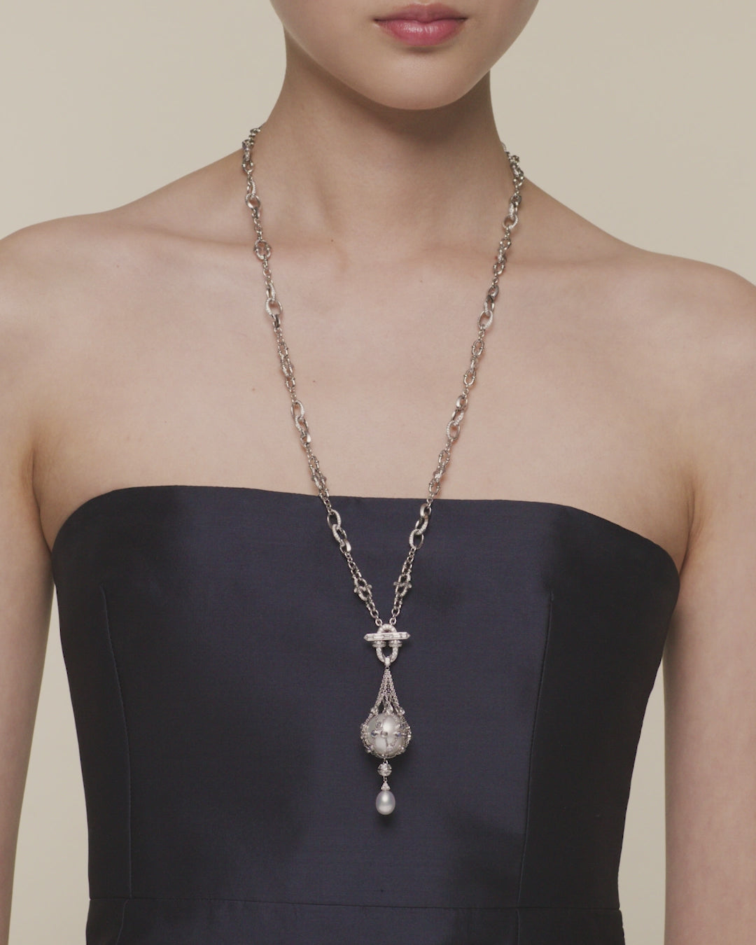 Moonstone anchored lavalier pearl necklace featuring an 18mm round South Sea pearl, moonstone and white gold