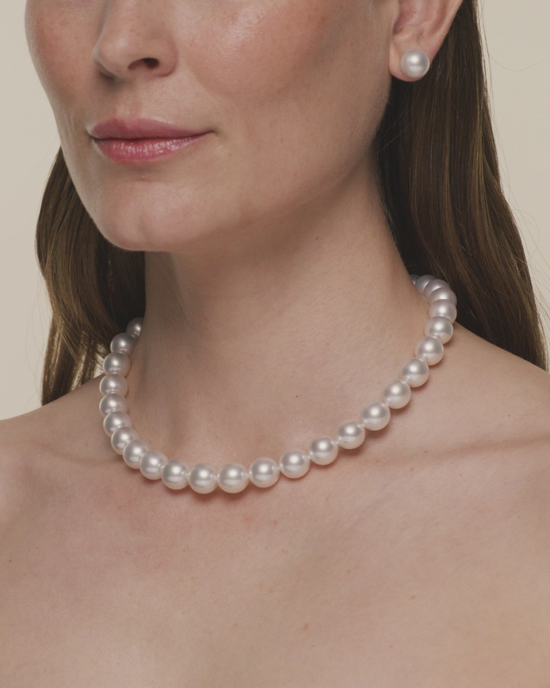 Oval pearl choker strand necklace featuring 11–12mm oval South Sea pearls and Paspaley signature diamond